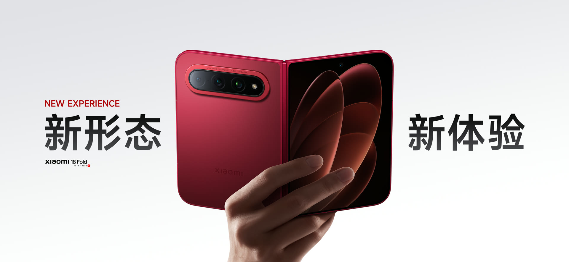 Xiaomi 18 Fold held open in one hand, back wing and inner display both visible